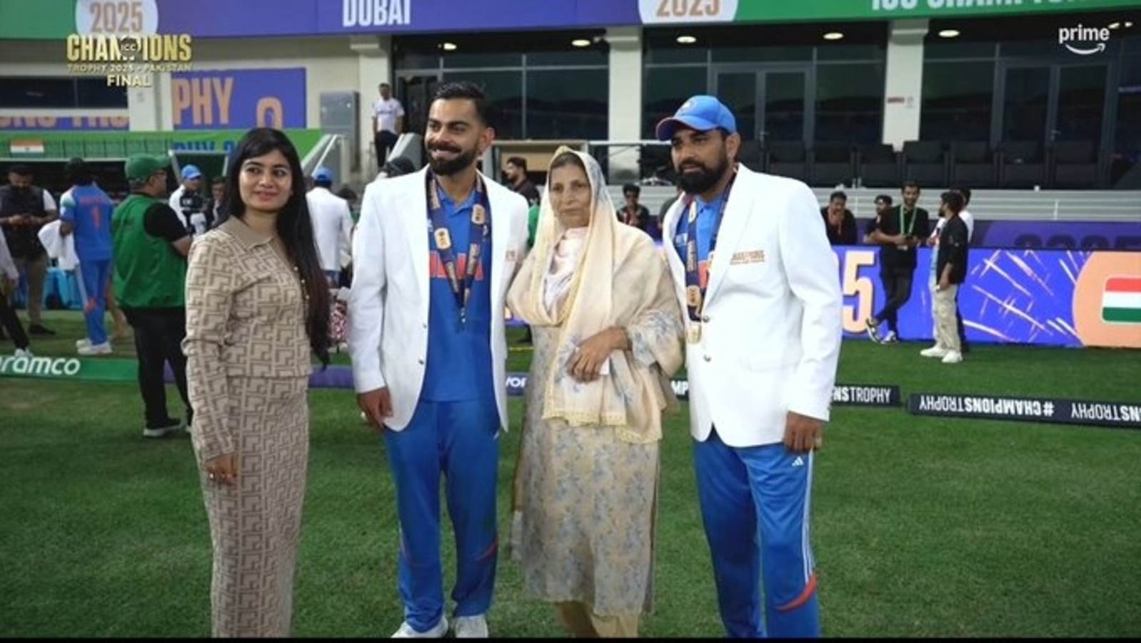 Virat Kohli touches feet of Mohammed Shami's mother in heart touching scenes after Champions Trophy win
