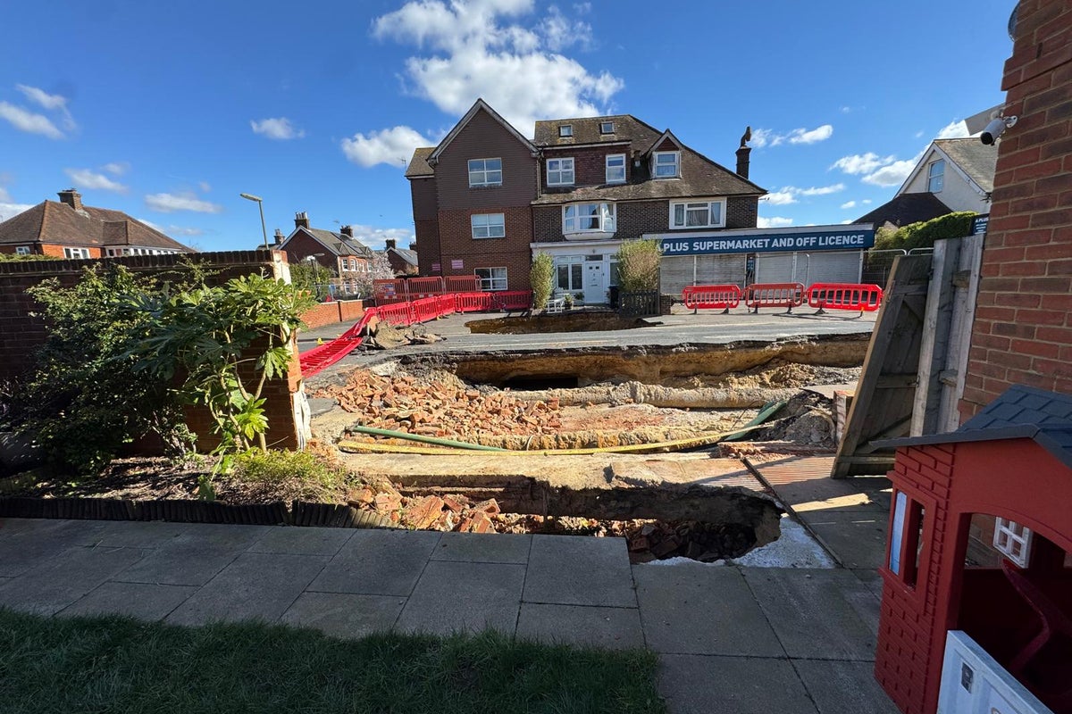 ‘Hours earlier and there would be deaths’: Father’s fears for children’s safety after giant sinkhole opens in garden