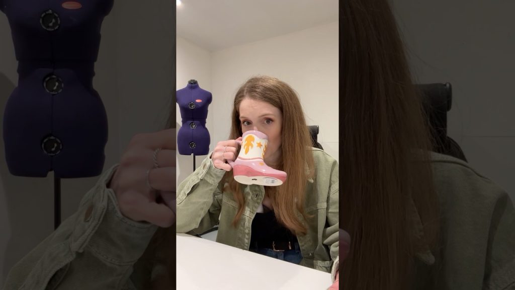 Just a mum pumping in my new sewing studio while drinking out of a cowboy mug. Holly dennett